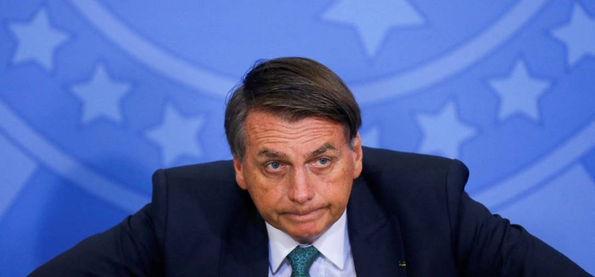 97214092_Brazils-President-Jair-Bolsonaro-looks-on-during-a-ceremony-at-the-Planalto-Palace-in-Bras
