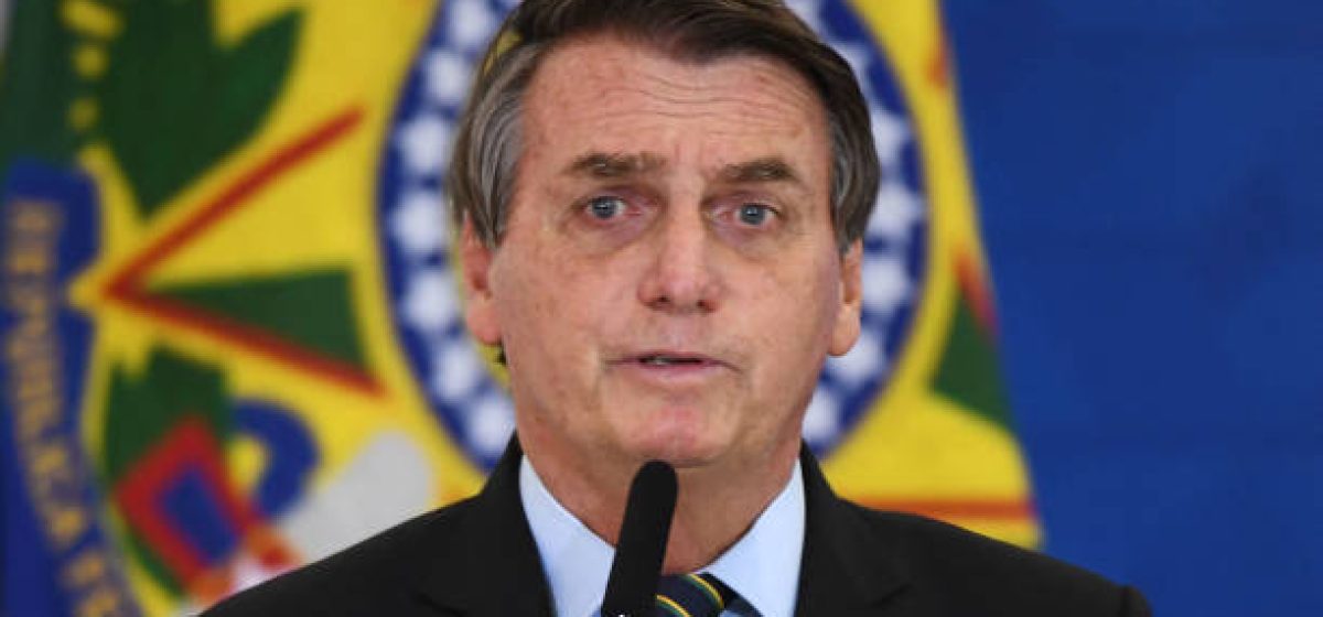 Brazilian President Jair Bolsonaro speaks during the announcement of support measures to philanthropic hospitals in the fight against the novel coronavirus disease, COVID-19, at Planalto Palace in Brasilia, on March 25, 2021. - Brazil's death toll in the coronavirus pandemic surpassed 300,000 on March 24, as a deadly surge that has pushed hospitals to the brink made it the second country after the United States to pass the bleak milestone. (Photo by EVARISTO SA / AFP) (Photo by EVARISTO SA/AFP via Getty Images)